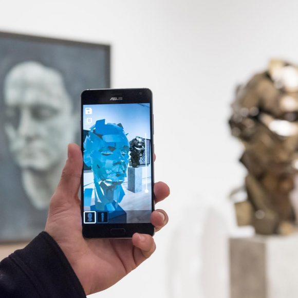 Artist Jonathan Yeo presents his work "Homage to Paolozzi", 2017, created using Google's Tilt Brush virtual reality software (shown on his mobile phone) at the preview of "From Life", a special exhibition at the Royal Academy examining what making art from life has meant to artists throughout history and how the practice has evolved as technology opens up new ways of creating artworks.