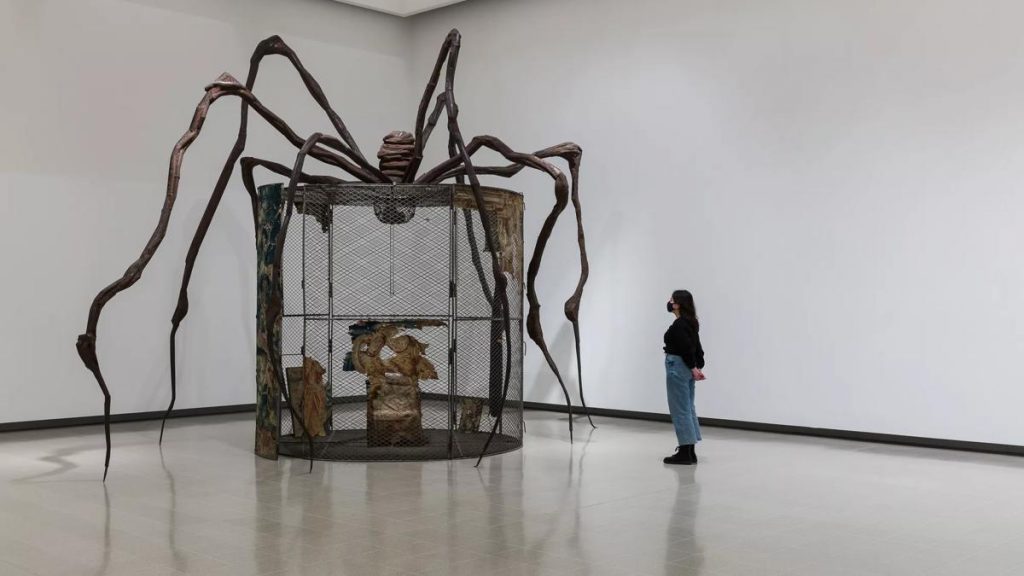 ADVANCE FOR SUNDAY APRIL 2 ** A spider sculpture hangs on the wall next to  a paragraph from artist Louise Bourgeois at the Walters Art Museum in  Baltimore Feb 9, 2006. A